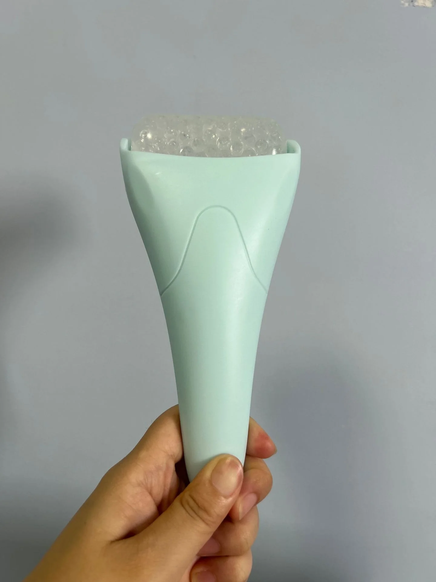 Pink Ergonomic Facial Ice Roller for Skincare and Wellness - Image 26