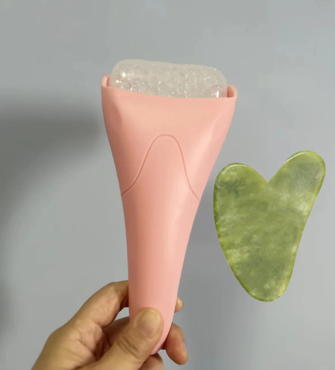 Pink Ergonomic Facial Ice Roller for Skincare and Wellness - Image 34