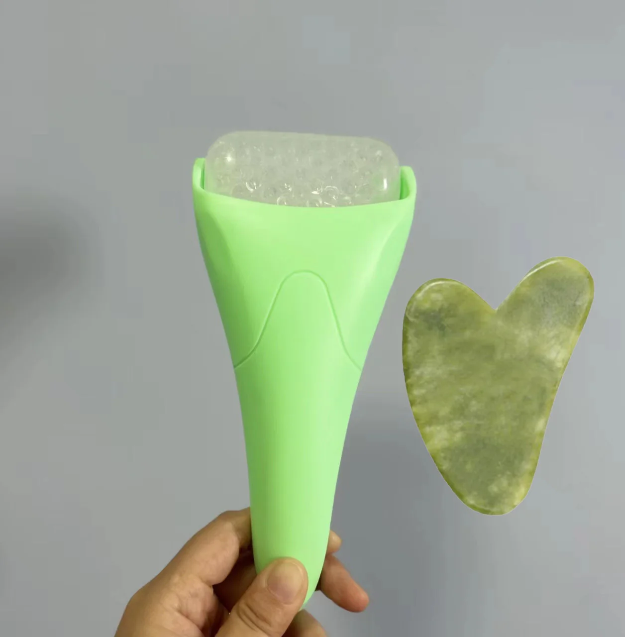 Pink Ergonomic Facial Ice Roller for Skincare and Wellness - Image 36